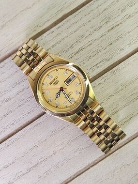 Seiko 5 Automatic Gold Tone Watch with Champagne Dial. Women